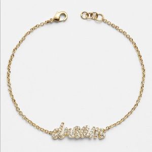 Ariella ‘Dream’ script bracelet